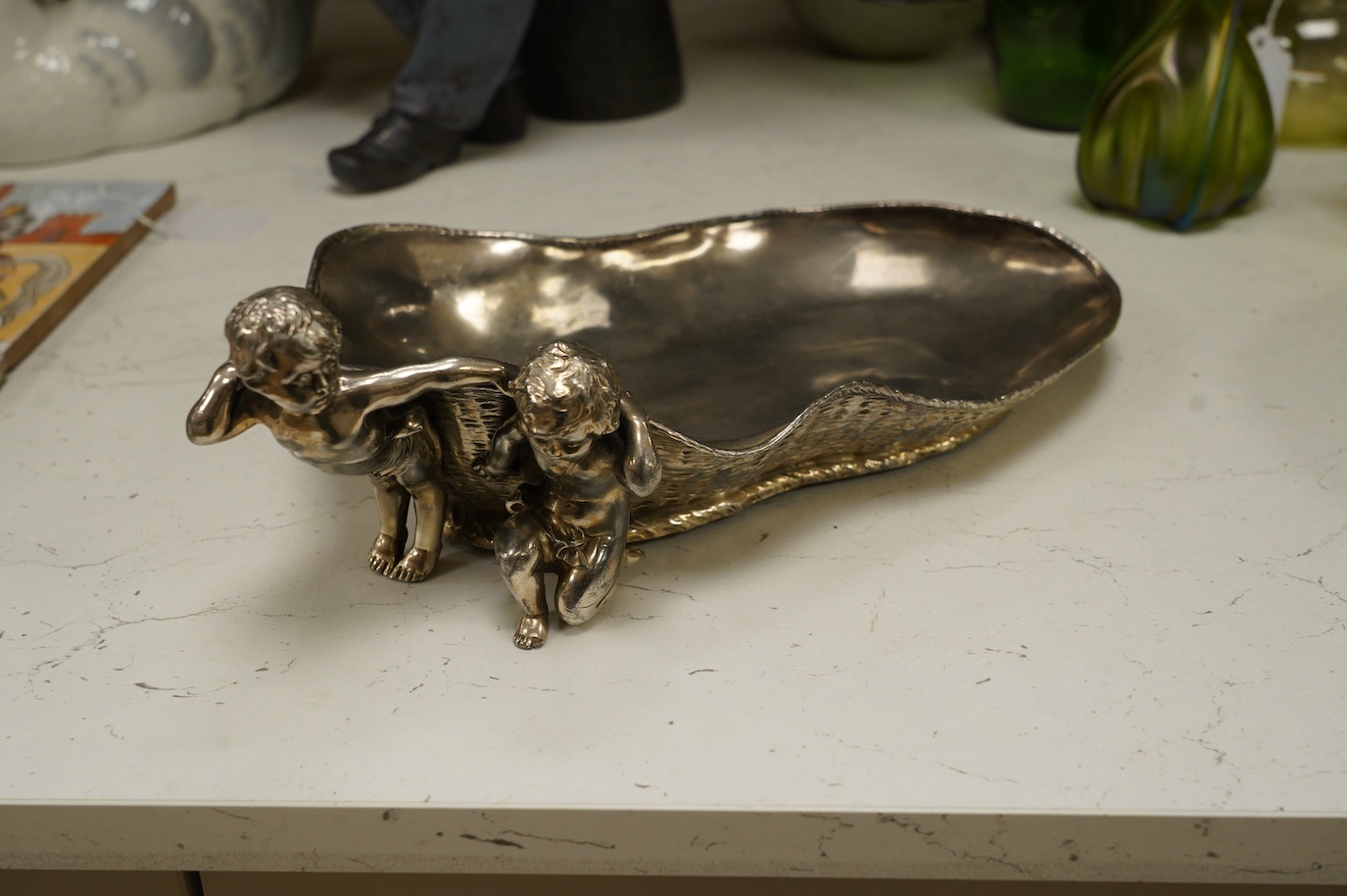 A WMF style plated pewter figural dish, stamped L.W.E.P. to base, 35cm wide. Condition - fair to good